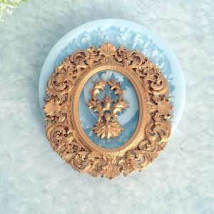 Молд ДП090 "Набір 'Овальна Рамка та Центральний Вензель'" рамка 7х6,7 см ( внутр. 4х3 см) і вензель 3х2,2 см ― Творча майстерня ДекоПарк